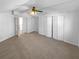 Large bedroom with carpet flooring and dual sliding-door closets at 3782 Westchase Dr, Marietta, GA 30066