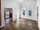 Bright dining area features hardwood floors, modern chandelier, and natural light at 3782 Westchase Dr, Marietta, GA 30066