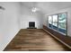 Inviting living room with wood floors, fireplace, and large windows at 3782 Westchase Dr, Marietta, GA 30066