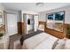 Comfortable staged bedroom with closet, natural light and neutral tones at 3782 Westchase Dr, Marietta, GA 30066