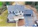 Birds eye view of the house, large yard, spacious deck, and driveway at 805 Wesley Oak Rd, Atlanta, GA 30328