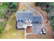 Birds eye view of the house, large yard, spacious deck, and driveway at 805 Wesley Oak Rd, Atlanta, GA 30328