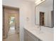 Bathroom featuring modern vanity with large mirror at 805 Wesley Oak Rd, Atlanta, GA 30328
