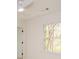 Bright bedroom with a window overlooking trees and a ceiling fan for comfort at 805 Wesley Oak Rd, Atlanta, GA 30328