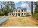 Stately two-story home with a manicured lawn and inviting entryway at 805 Wesley Oak Rd, Atlanta, GA 30328