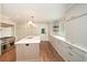 Updated kitchen featuring custom cabinets, a spacious island, and stainless steel appliances at 805 Wesley Oak Rd, Atlanta, GA 30328
