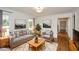 Inviting living room featuring a neutral color palette, hardwood floors, and stylish decor at 805 Wesley Oak Rd, Atlanta, GA 30328