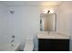 Bathroom features subway tile, dark vanity cabinets, and modern fixtures at 805 Wesley Oak Rd, Sandy Springs, GA 30328