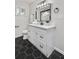 Stylish bathroom featuring a hexagon tile floor, white vanity, and modern fixtures at 3393 Phillip Cir, Decatur, GA 30032