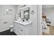 Stylish bathroom featuring a hexagon tile floor, white vanity, and modern fixtures at 3393 Phillips Cir, Decatur, GA 30032