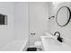 Bathroom with tile shower, modern fixtures, and vanity at 3393 Phillip Cir, Decatur, GA 30032