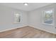 Bedroom with natural light and wood-style flooring at 3393 Phillip Cir, Decatur, GA 30032