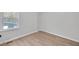 Bright bedroom with natural light and wood-style flooring at 3393 Phillip Cir, Decatur, GA 30032