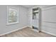 Well lit closet featuring built in shelving and a large window at 3393 Phillip Cir, Decatur, GA 30032