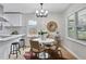 Bright dining area with a modern light fixture and sleek furniture at 3393 Phillip Cir, Decatur, GA 30032