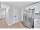 Stainless steel refrigerator and ample storage in the stylish, bright kitchen at 3393 Phillip Cir, Decatur, GA 30032