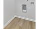 Laundry room features wood flooring, white trim, and sleek laundry hookups at 3393 Phillip Cir, Decatur, GA 30032