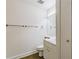 Clean half bathroom with a neutral color scheme and tile flooring at 44 Finch Ne Trl, Atlanta, GA 30308