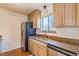 Bright kitchen featuring stainless steel appliances and granite countertops at 44 Finch Ne Trl, Atlanta, GA 30308