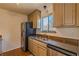 Bright kitchen features stainless steel appliances and an undermount sink at 44 Finch Ne Trl, Atlanta, GA 30308