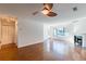 Spacious living room featuring hardwood floors, a fireplace, and natural light at 44 Finch Ne Trl, Atlanta, GA 30308