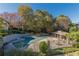 Wonderful community pool area surrounded by trees and landscaping and with lounge seating at 44 Finch Ne Trl, Atlanta, GA 30308