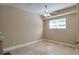 Bedroom featuring neutral paint, tile floors, a ceiling fan and a window at 2837 Davidson Dr, Lithonia, GA 30058