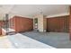 Spacious carport with a brick wall, offering sheltered parking and extra storage at 2837 Davidson Dr, Lithonia, GA 30058