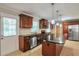 Updated kitchen features stainless steel appliances, granite countertops, and a central island at 2837 Davidson Dr, Lithonia, GA 30058