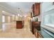 Modern kitchen with granite counters, stainless appliances, and open access to living area at 2837 Davidson Dr, Lithonia, GA 30058