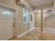 Spacious room with exterior access, tile floors, neutral paint and white trim at 2837 Davidson Dr, Lithonia, GA 30058