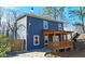 Exterior backyard view with covered patio, wooden fence, and string lights at 1659 Olympian Sw Way, Atlanta, GA 30310