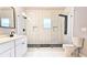 Bathroom featuring a modern shower with a glass enclosure and double shower head at 1659 Olympian Sw Way, Atlanta, GA 30310
