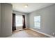 Comfortable bedroom with natural light, neutral walls, and classic finishes at 1659 Olympian Sw Way, Atlanta, GA 30310