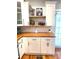 Bright, renovated kitchen featuring white cabinets, subway tile, and butcher block countertops at 1659 Olympian Sw Way, Atlanta, GA 30310