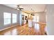 Bright kitchen with stainless steel appliances, a center island, and hardwood floors at 1659 Olympian Sw Way, Atlanta, GA 30310