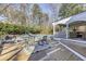 Large wooden deck offers a nice view of the backyard and a covered pool and sitting area at 1742 Dunridge Ct, Dunwoody, GA 30338