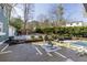 Inviting backyard deck area for outdoor dining and relaxation, complemented by mature trees and privacy at 1742 Dunridge Ct, Dunwoody, GA 30338