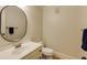 Well-maintained bathroom with classic vanity, toilet, and neutral wall color at 1742 Dunridge Ct, Dunwoody, GA 30338