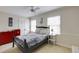 Cozy bedroom with ceiling fan, a closet, two windows, and neutral wall color at 1742 Dunridge Ct, Dunwoody, GA 30338
