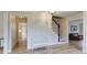 Inviting foyer with light wood floors, a staircase, and white trim at 1742 Dunridge Ct, Dunwoody, GA 30338