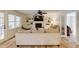 Spacious living room with a large sofa, built-in bookshelves, and stylish decor at 1742 Dunridge Ct, Dunwoody, GA 30338