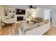 Cozy living room with a fireplace, built-in shelving, and comfortable seating at 1742 Dunridge Ct, Dunwoody, GA 30338