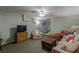 Partially finished basement offering a cozy seating area and television for entertainment at 180 Winecoff Dr, Fayetteville, GA 30214