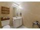 Cozy bathroom featuring a vanity with a sleek sink and ample storage at 180 Winecoff Dr, Fayetteville, GA 30214