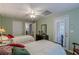 Bedroom with two beds, access to a balcony, and neutral walls offering a relaxing ambiance at 180 Winecoff Dr, Fayetteville, GA 30214