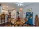 Open breakfast nook with a view into the bright kitchen at 180 Winecoff Dr, Fayetteville, GA 30214