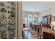 Formal dining room with hardwood floors and decorative china cabinet at 180 Winecoff Dr, Fayetteville, GA 30214