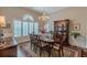 Formal dining room features an elegant chandelier, and large windows at 180 Winecoff Dr, Fayetteville, GA 30214