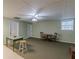 Game room has both carpet and tile flooring at 180 Winecoff Dr, Fayetteville, GA 30214
